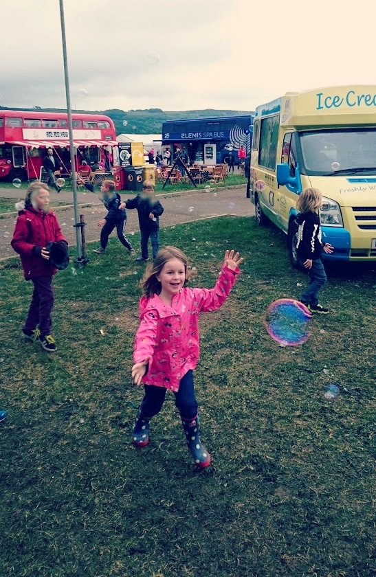 Boo chasing bubbles at Wychwood