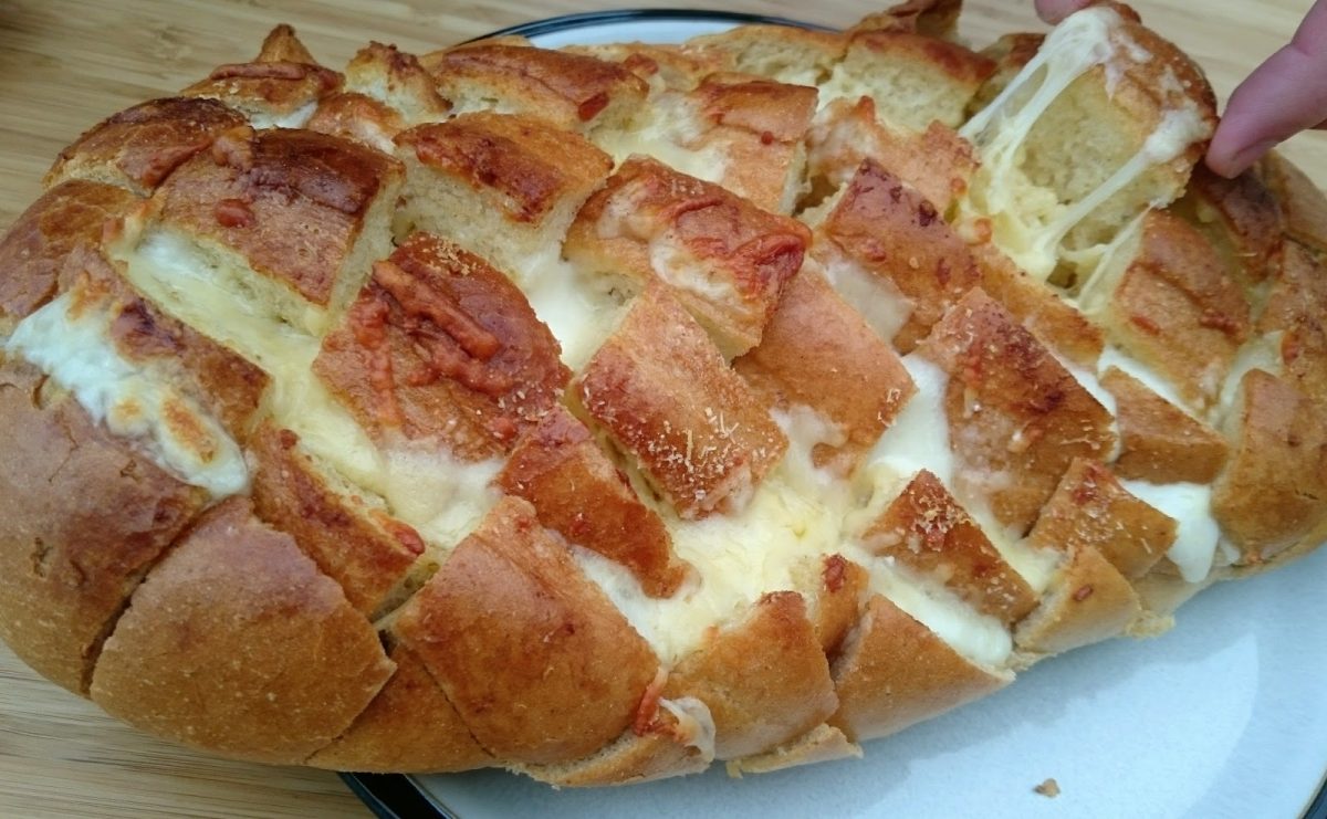 warm-three-cheese-stuffed-bread-served
