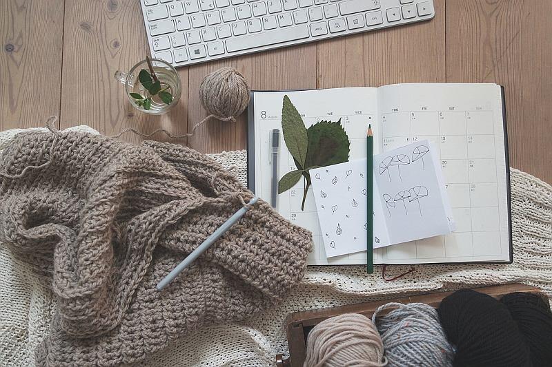 knitting and notebook